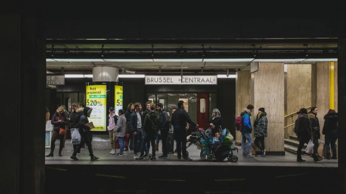 people gathering at train station